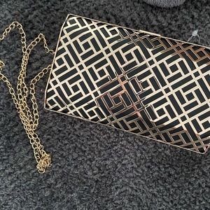 Clutch with crossbody chain - gold. With tags